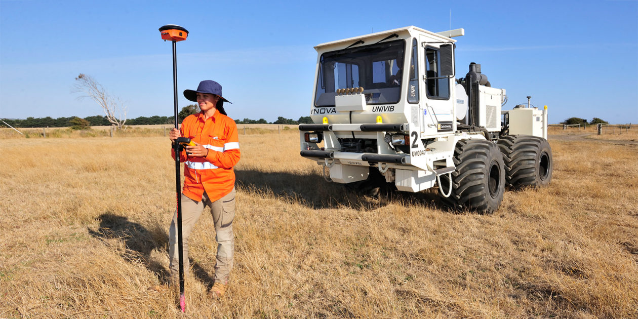 Exploration geophysics student in a field