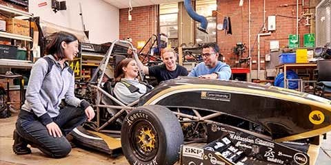 Liz, Natalia, Dylan and Wayne working together at the Curtin Motorsport Team workshop